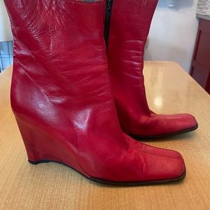 Red leather square-toe side zip booties.